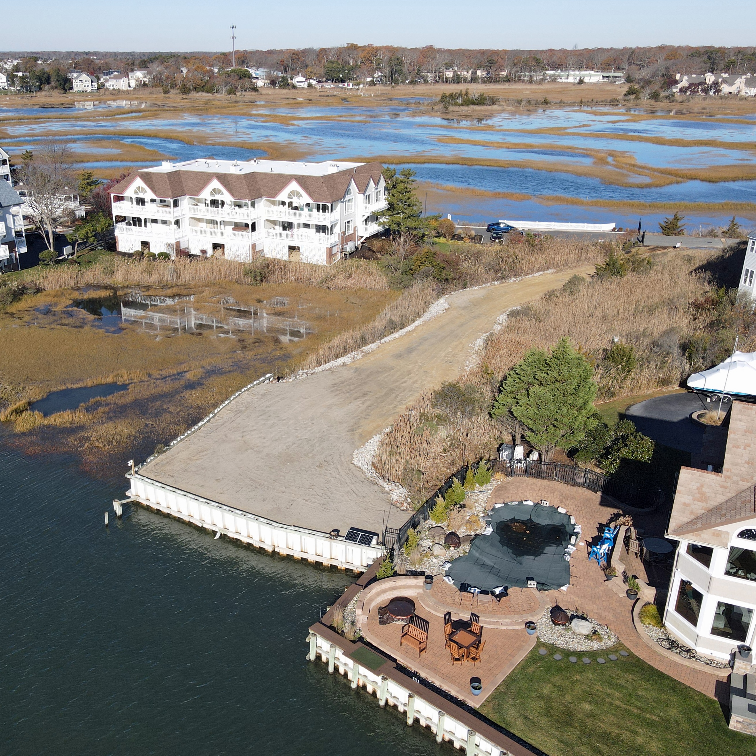 Drone view looking west across the marsh from the bulkhead at 104 Broadway.