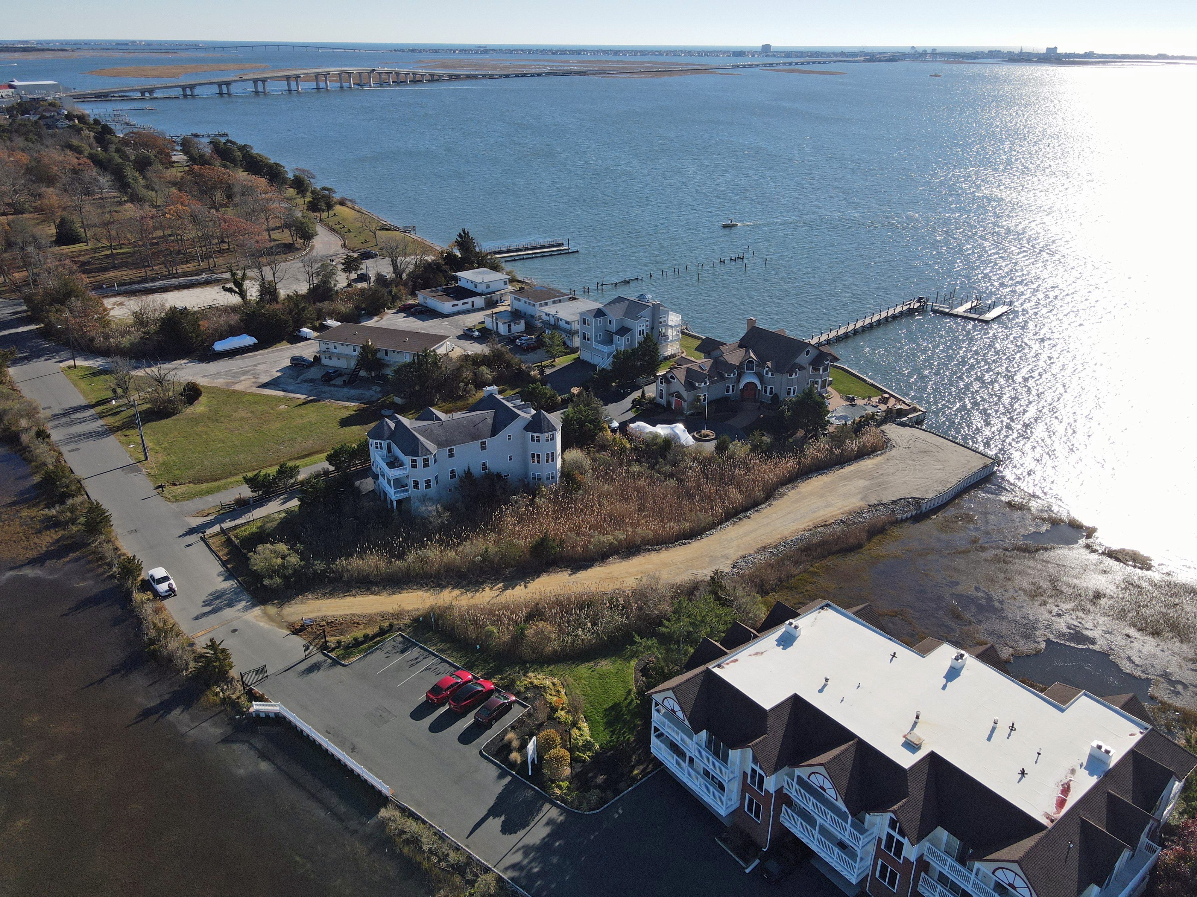 Drone view of 104 Broadway looking east across Great Egg Harbor Bay toward the Ocean City–Somers Point bridge.