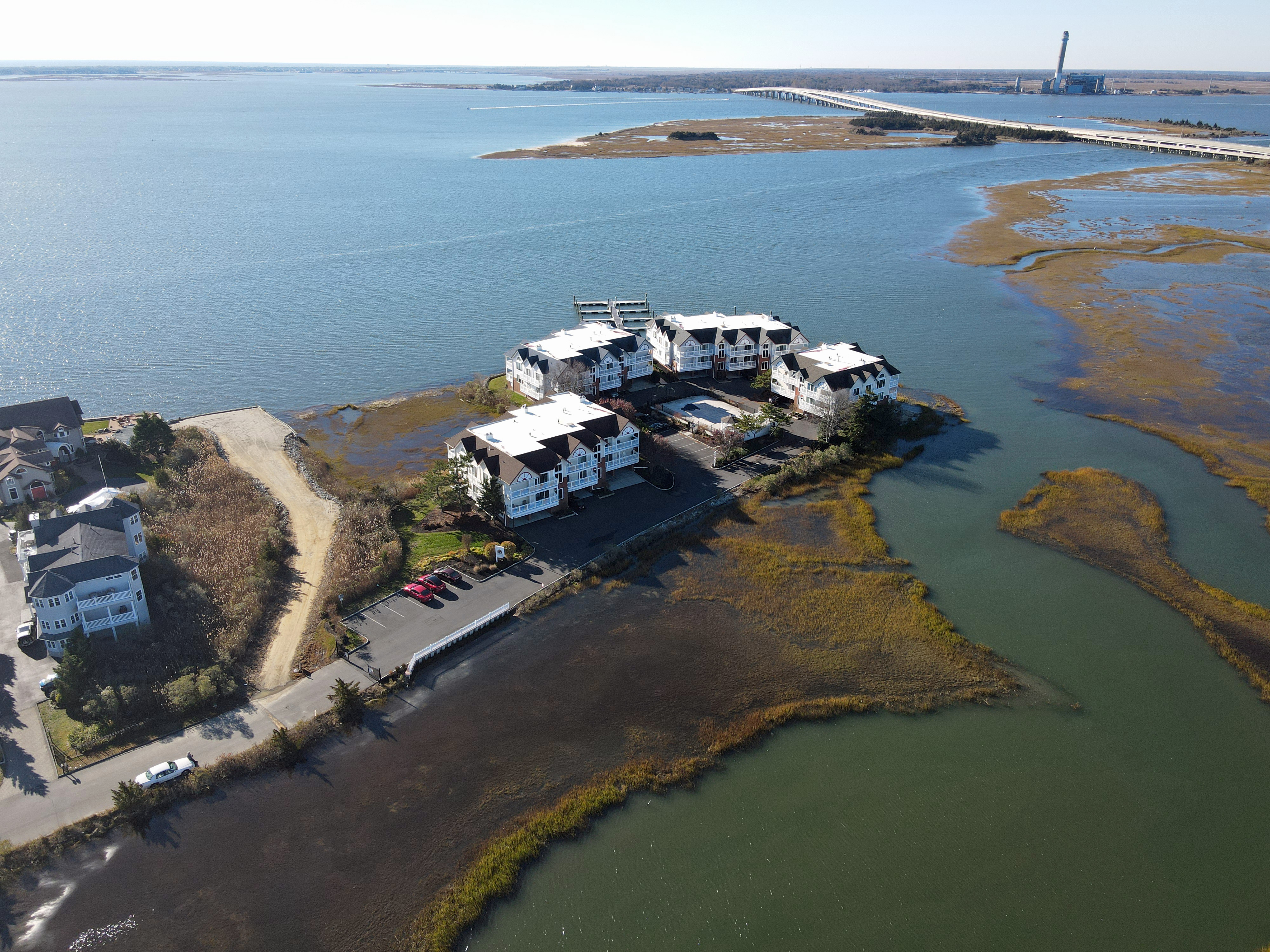 Drone view looking south across Great Egg Harbor Bay from above 104 Broadway.
